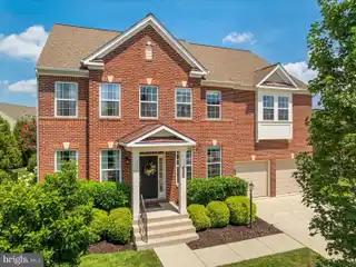 Magnificent and Spacious Brick-Front Residence