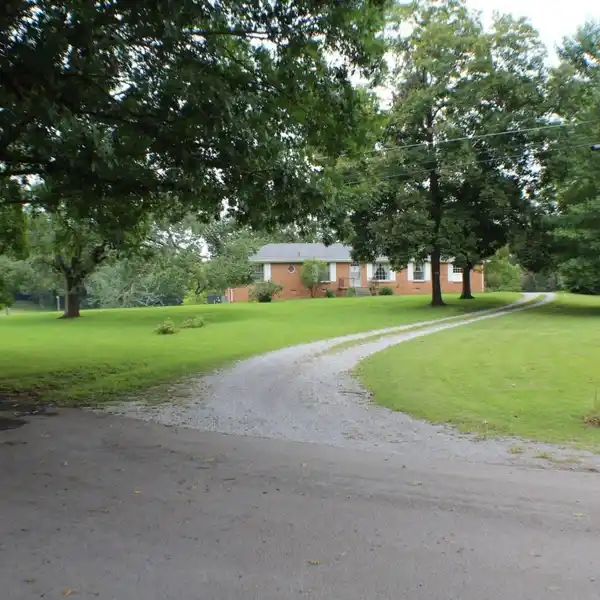 PEACEFUL QUIET FARM WITH ALL BRICK HOME AND HISTORIC BARN