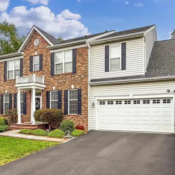 IMPECCABLE BRICK-FRONT COLONIAL IN PRIME LOCATION