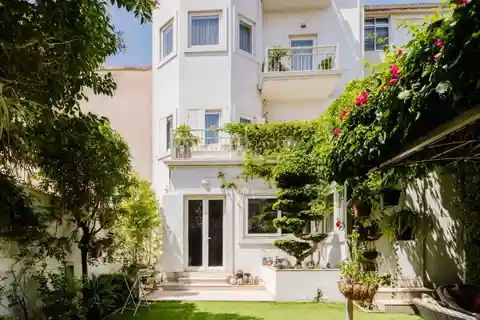 Elegant Residence with Private Garden and River Views