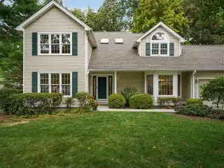 Elegant End-Unit in Prestigious Riverwoods Community