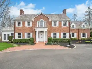 Gracious and Grand Brick Center Hall Colonial