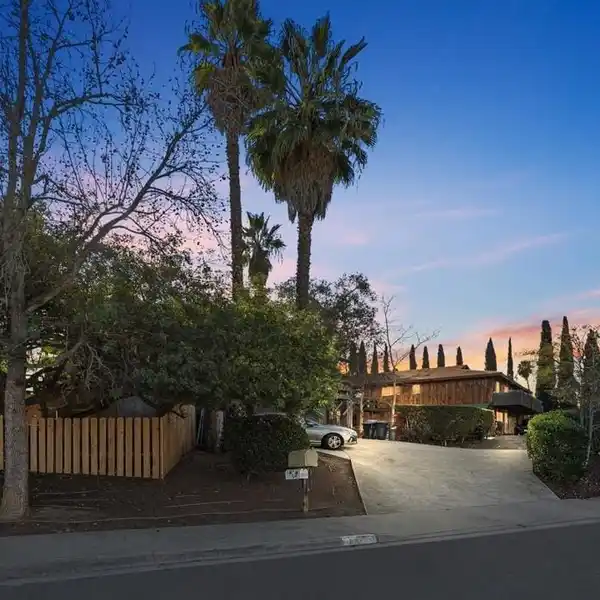 UNMATCHED MULTI-GENERATIONAL LIVING ON OVER .64 ACRES WITH TWO HOMES