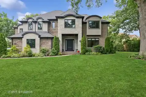 Elegant Brick & Stone Estate on Secluded Grounds