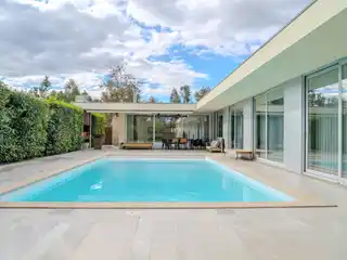 Contemporary Riverside Villa with Heated Pool