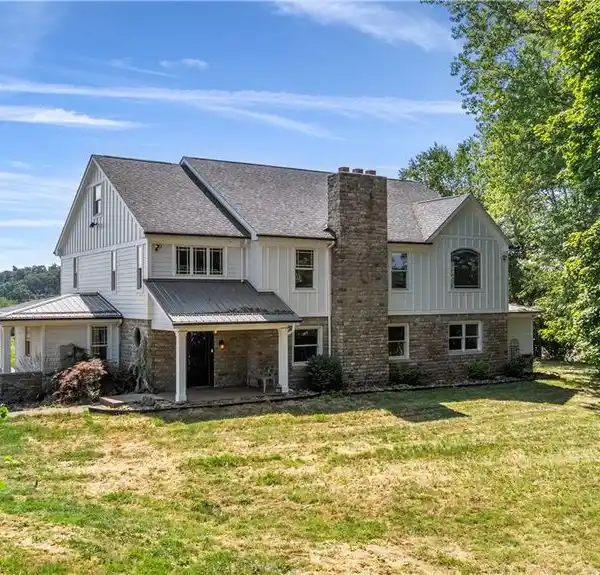 STUNNING CRAFTSMAN FARMHOUSE ON 1.5 SERENE ACRES