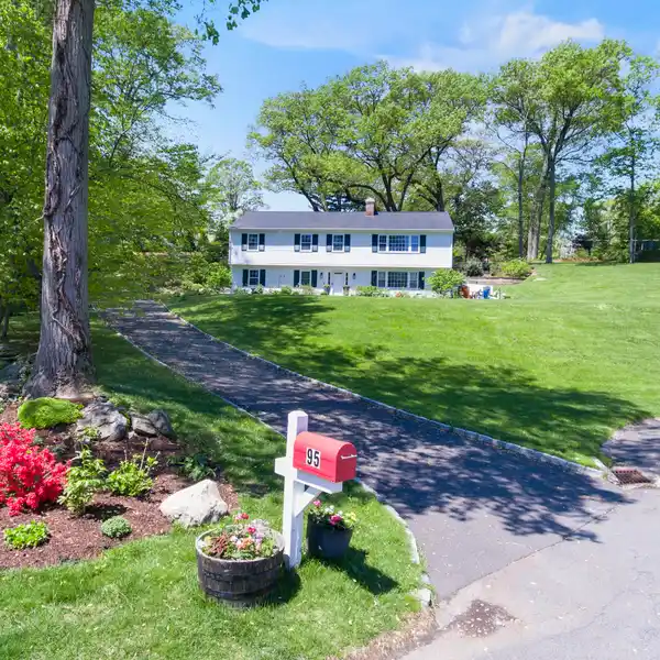 WELCOMING HOME ON A SOUGHT-AFTER CUL-DE-SAC