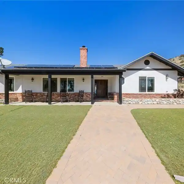 TWO HOMES ON OVER 15 ACRES