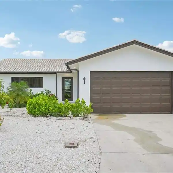 STUNNING WATERFRONT POOL HOME