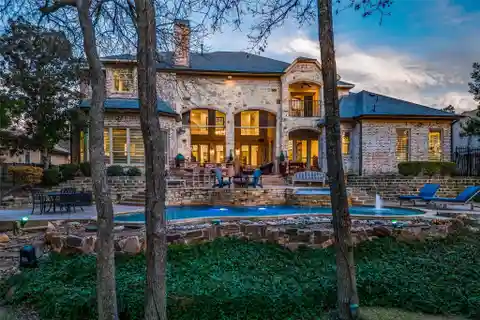 Custom Home by Award Winning Builder on 1/2 Acre Creek Lot in Gated Neighborhood