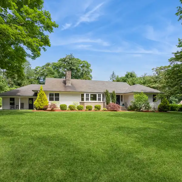 EXQUISITE SINGLE-STORY HOME IN PARK-LIKE SETTING