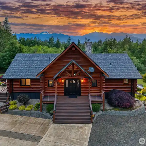 IMPECCABLE LOG HOME ON 5.7 BEAUTIFUL ACRES