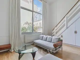 Artistic Duplex with Dramatic Loft-Style Ambiance