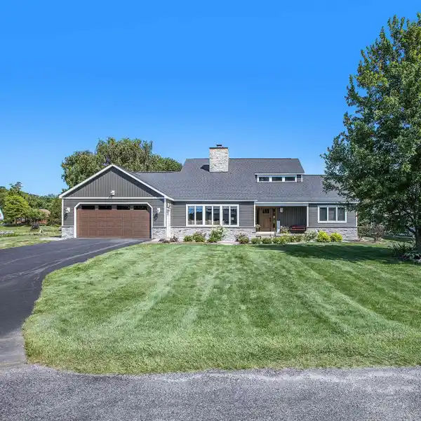 BEAUTIFULLY MAINTAINED HOME WITH CANAL FRONTAGE