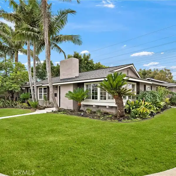 SINGLE-LEVEL STUNNER WITH TROPICAL BACKYARD OASIS