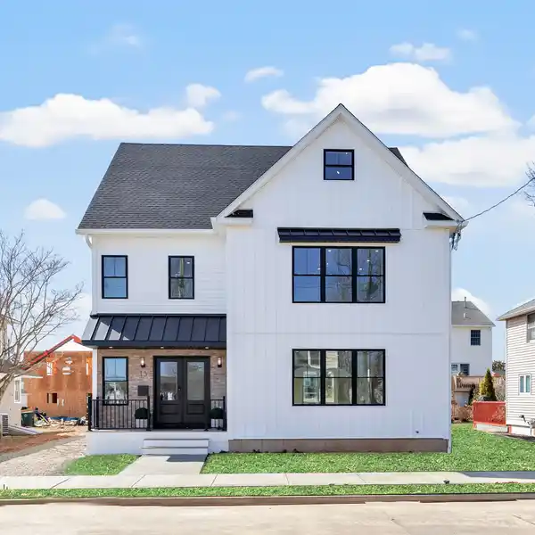 NEW CONSTRUCTION MODERN FARMHOUSE STEPS FROM THE BEACH