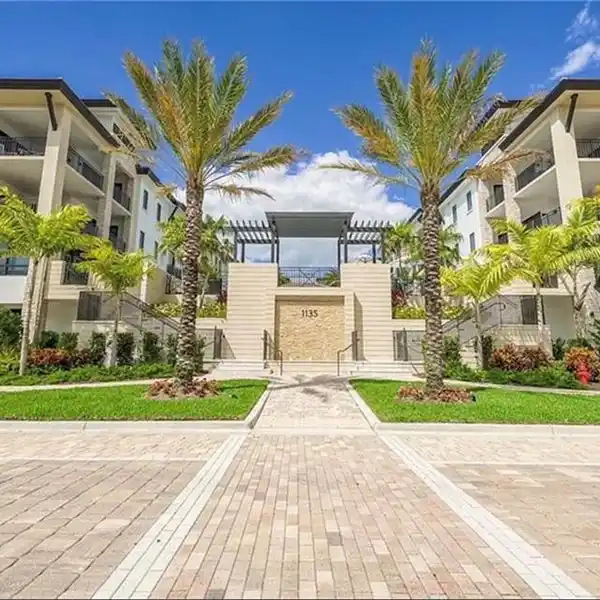 ELEVATED LIVING IN PRESTIGIOUS NAPLES SQUARE