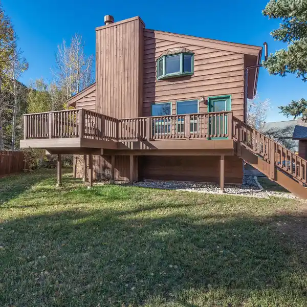 SUN-FILLED DUPLEX WITH SPACIOUS TREX DECK