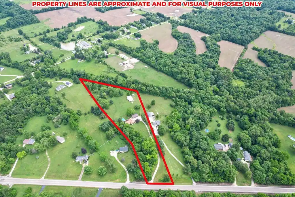 Comfortable Home on Six Acres of Impeccably Kept Park Like Land