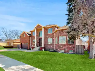 Stately Brick Home with Dramatic Architectural Flair