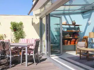 Sunlit Art Nouveau Penthouse with Private Roof Terrace