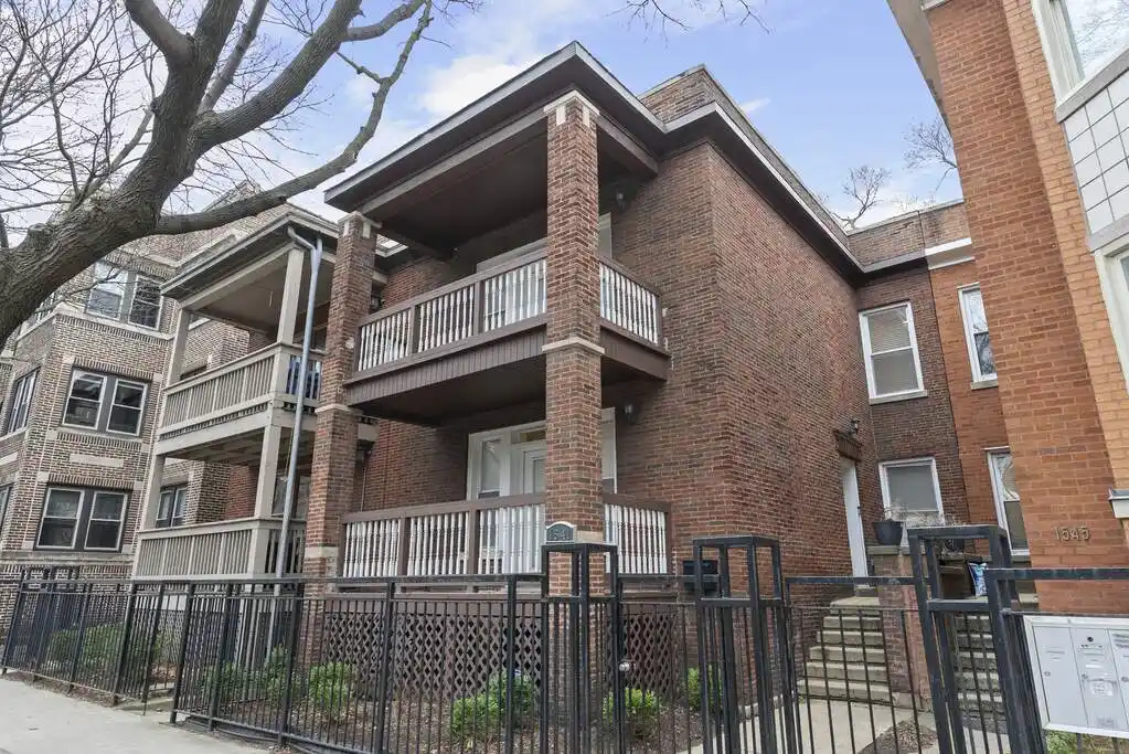 Beautifully Rehabbed Solid Brick Home