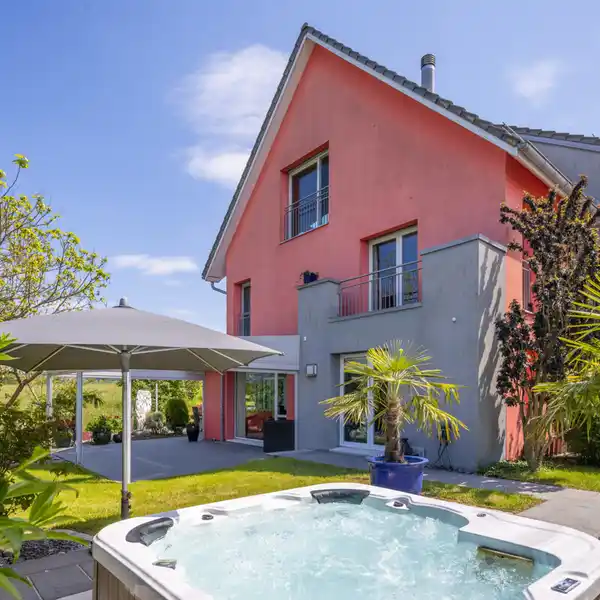 FAMILY RESIDENCE WITH GARDEN OASIS AND LARGE GARAGE IN HOCHFELDEN