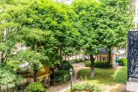 Elegant Paris Apartment Overlooking Private Garden