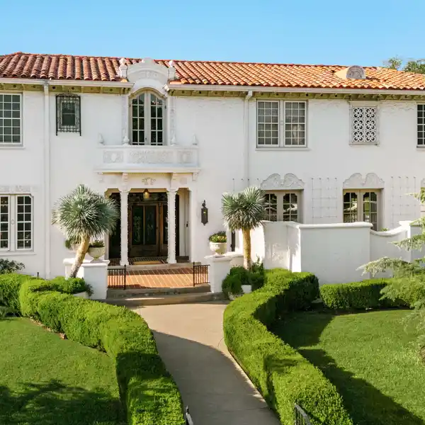 SPANISH REVIVAL ELEGANCE MEETS TIMELESS COMFORT