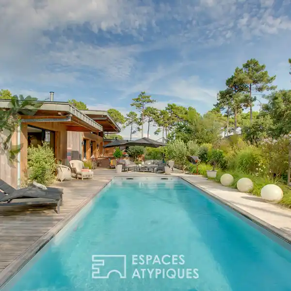CONTEMPORARY LUXURY HOME IN HARMONY WITH ITS SURROUNDINGS