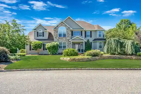 Updated Post-Modern Colonial in Country Manor Estates