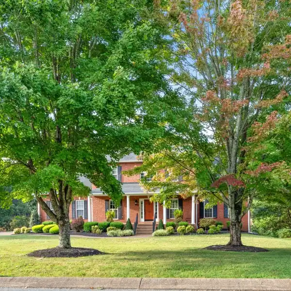 ALL BRICK BEAUTY ON 1+ ACRE LOT