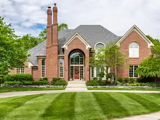 Custom Estate with Serene Waterfront Setting