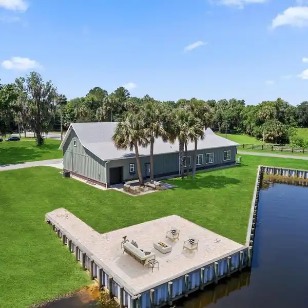 CUSTOM LAKEFRONT MASTERPIECE WITH UNBEATABLE WATER VIEWS