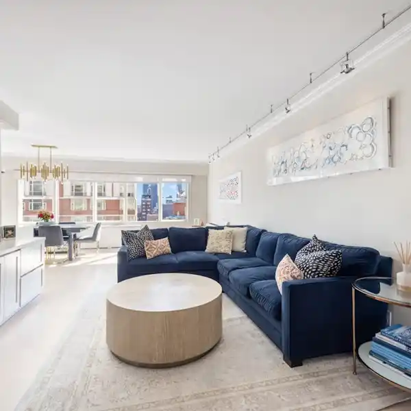 SUNLIT RENOVATED HOME WITH RARE LOW CARRYING COSTS