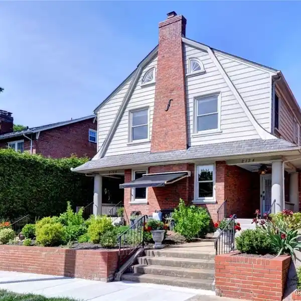 STATELY AND VERSATILE BRICK RESIDENCE