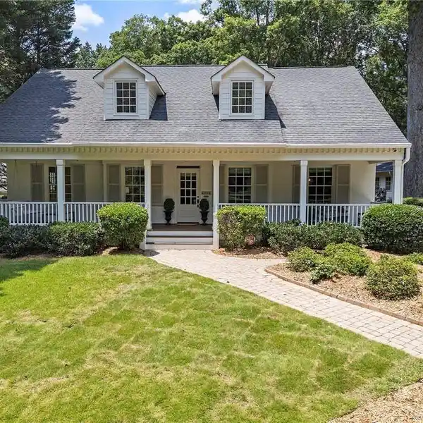ENCHANTING CAPE COD-STYLE RESIDENCE IN HISTORIC DRUID HILLS