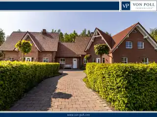 Stylish Two-family House with Commercial Hall