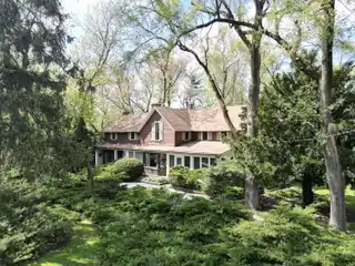 Spacious Home on 110 Acres with Barn and Pond