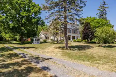 Spectacular Renovated Cobblestone Mansion on 12 Glorious Acres