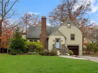 Enchanting 1929 Tudor with Thoughtful Modern Updates
