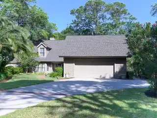 Light-Filled Home with Manicured Grounds