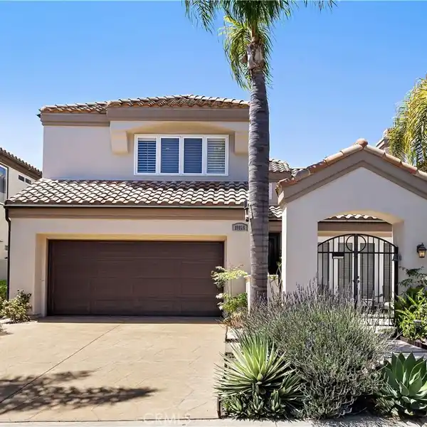 HIGHLY UPGRADED HOME IN AN EXCLUSIVE GATED COMMUNITY