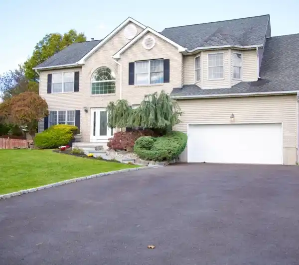 ELEGANT COLONIAL FEATURING MODERN UPGRADES AND OVERSIZED YARD