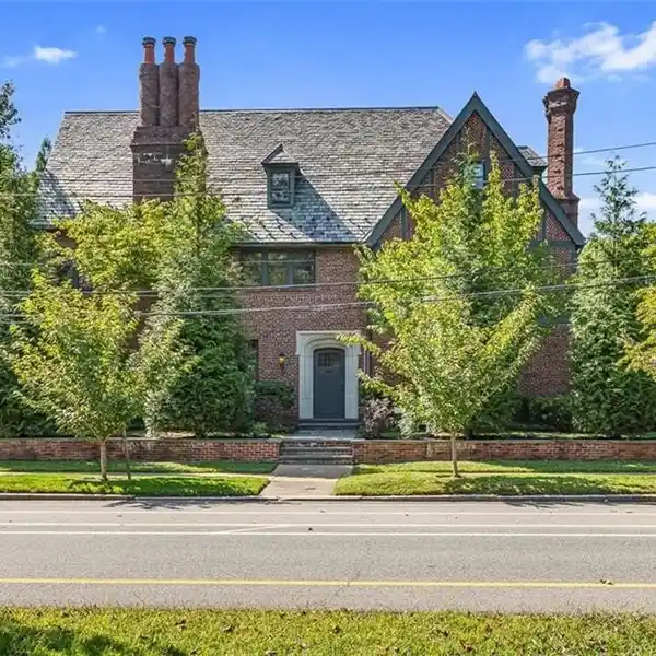 HANDSOME BRICK TUDOR REVIVAL STYLE HOME