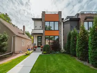 Striking Home with Rooftop Skyline Views