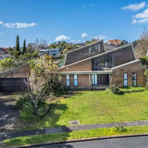 BRICK AND CEDAR HOME WITH NORTH-FACING BACKYARD