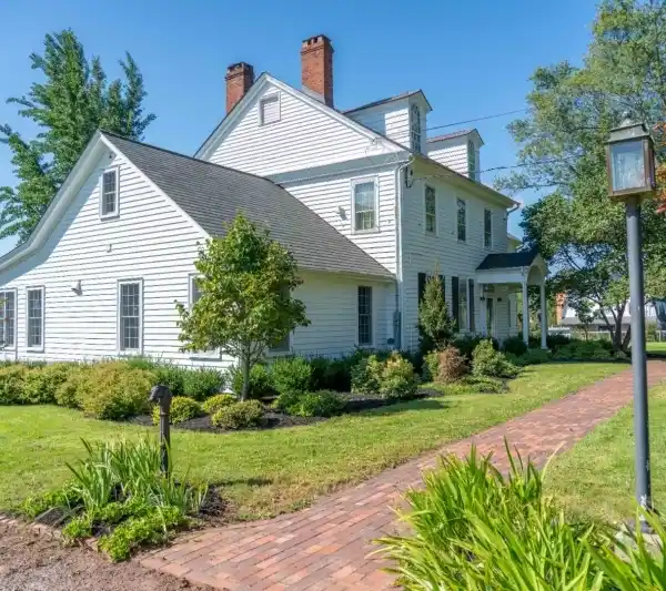 METICULOUSLY RESTORED COLONIAL HOME ON EXPANSIVE EQUESTRIAN PROPERTY
