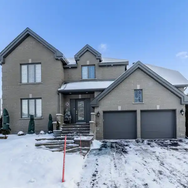EXCEPTIONAL SIX BEDROOM HOME ON A QUIET CUL-DE-SAC