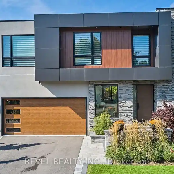 STRIKING CUSTOM HOME STEPS FROM LAKE ONTARIO